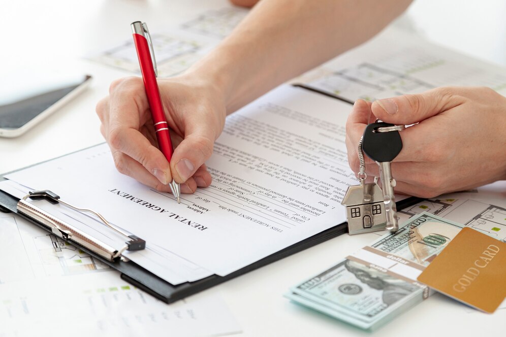 Signing contract for new home - Top real estate agent in Aliso Viejo.